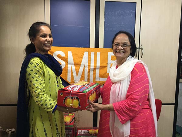 Women at UDAAN Receive Gift Hampers with Mangoes and Spices